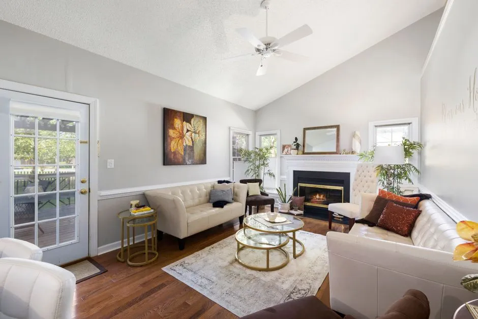 Living room furniture and decor arranged and staged for a sale